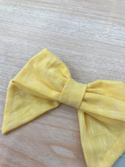 Fermaglio Belan in cotone fiocchetto giallo