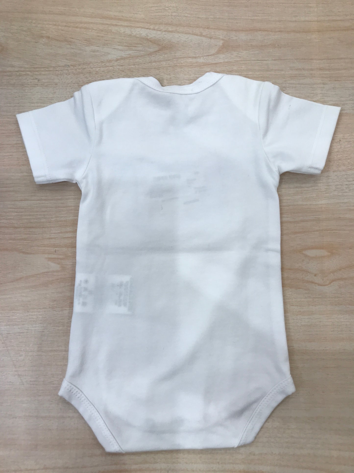 Body Nanan in cotone mezza manica bianco con scritta celeste sul davanti