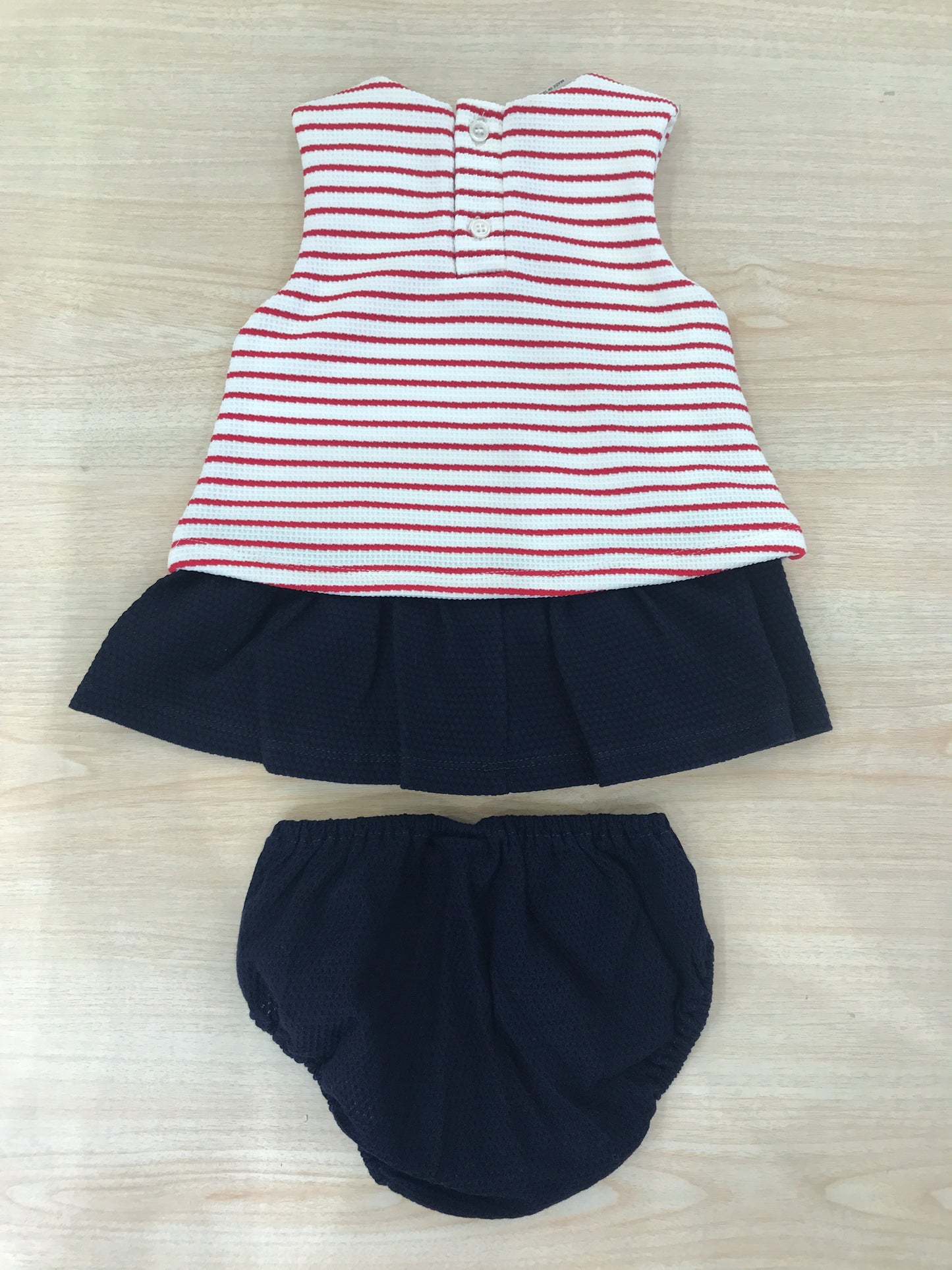 Abito Paz Rodriguez in cotone smanicato a righe bianche e rosse con rusche blu con culotte