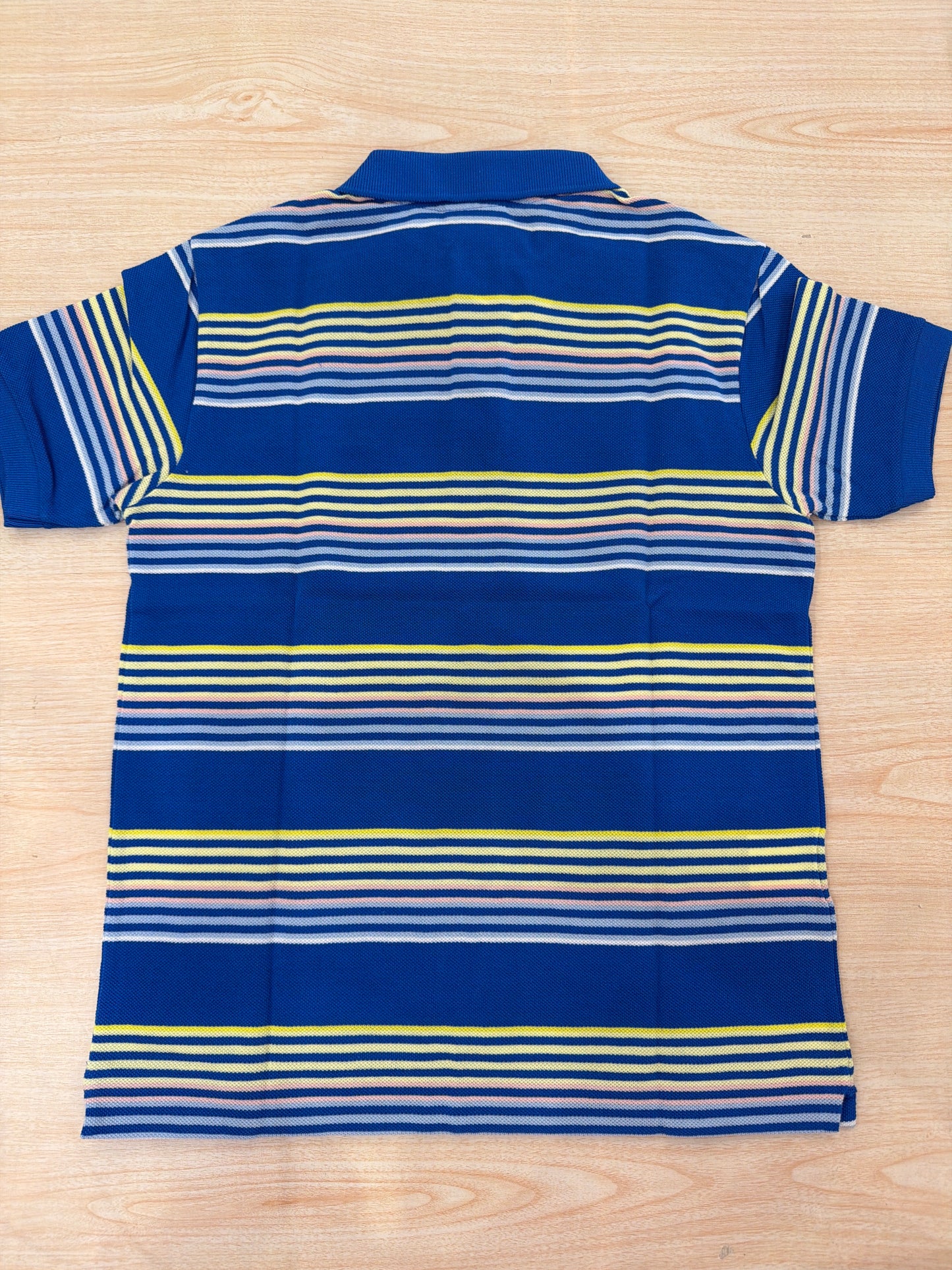 Polo Lacoste in cotone mezza manica con bottoncini e logo ricamato lateralmente unisex