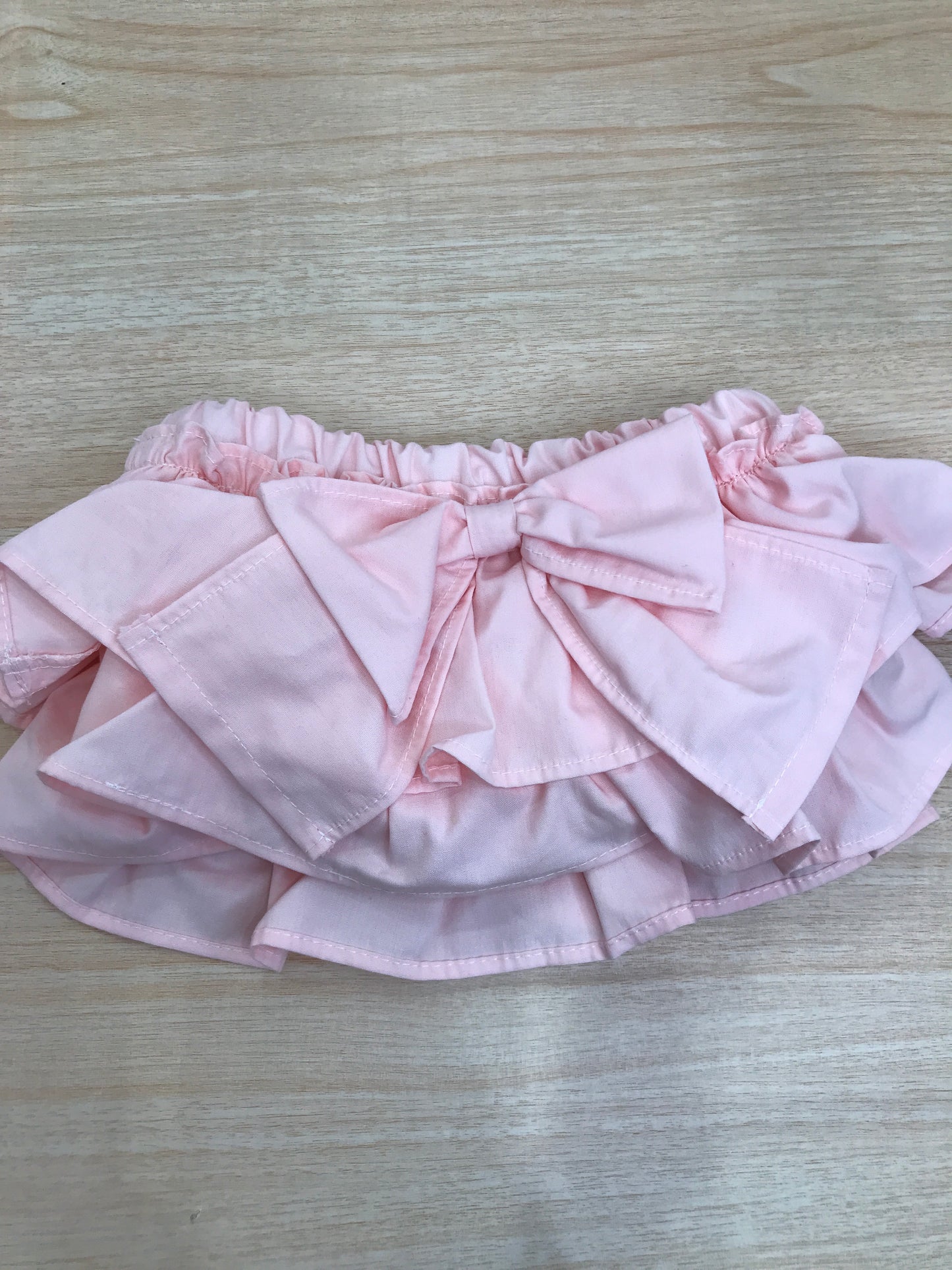 Culotte Fofettes in cotone rosa con rusche e con fiocco sul retro
