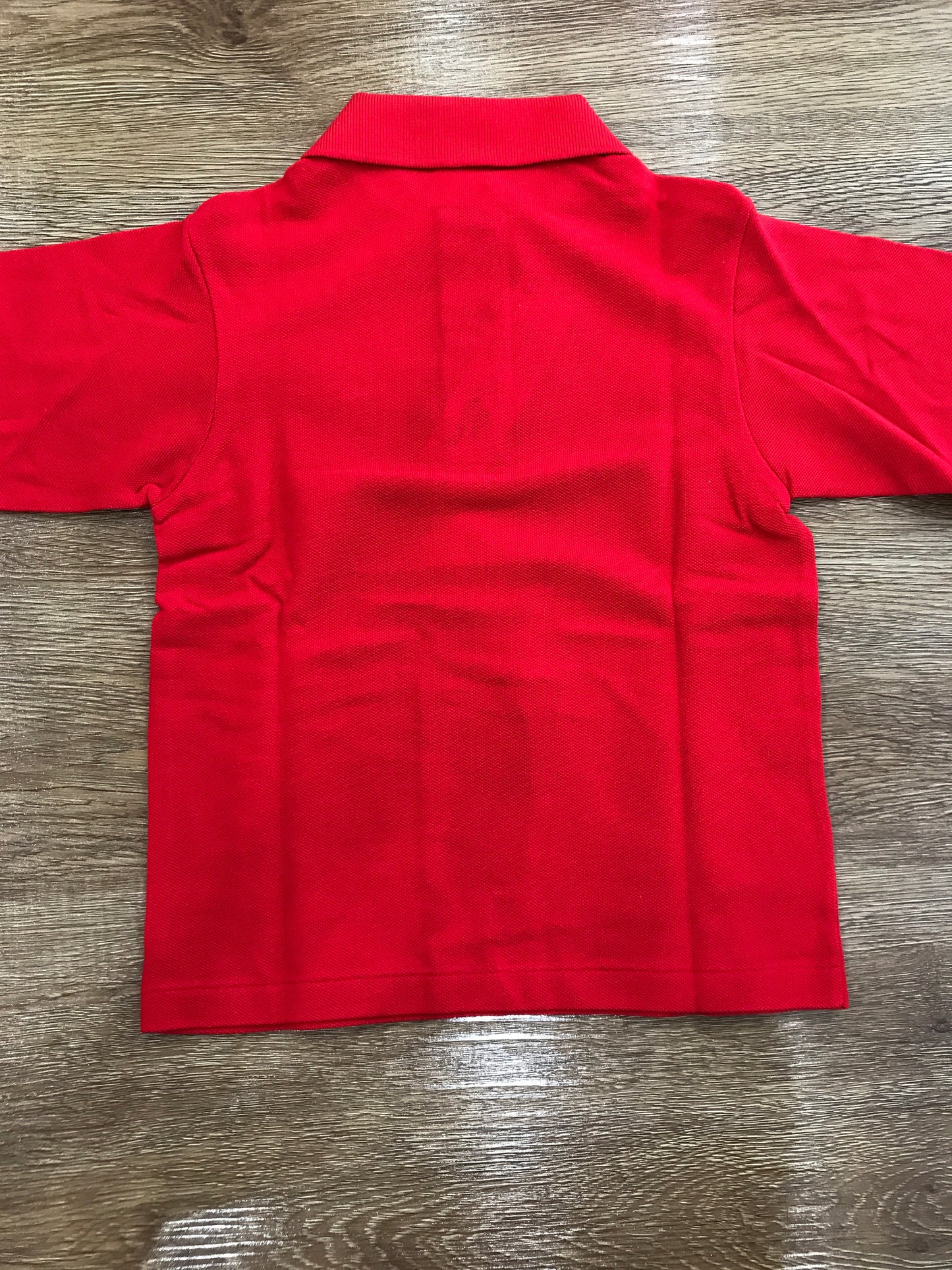 Polo Lacoste manica lunga con polsini e bottoncini