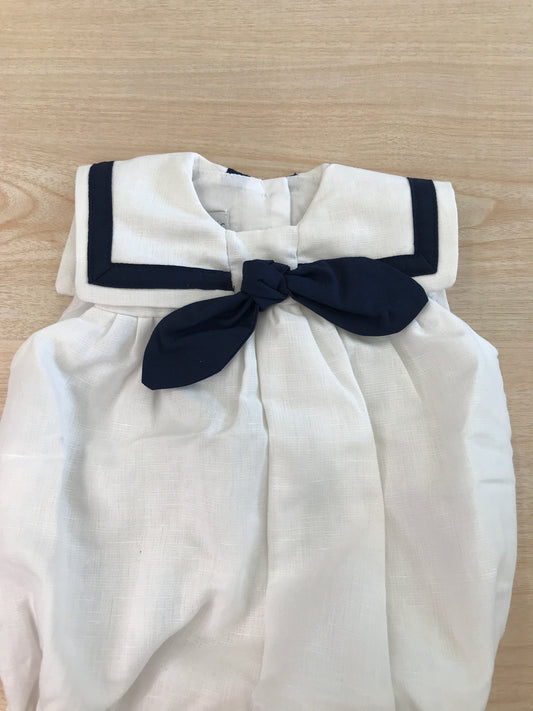 Pagliaccetto Fofettes in lino panna con collo marinaretto con profilo e nodino blu