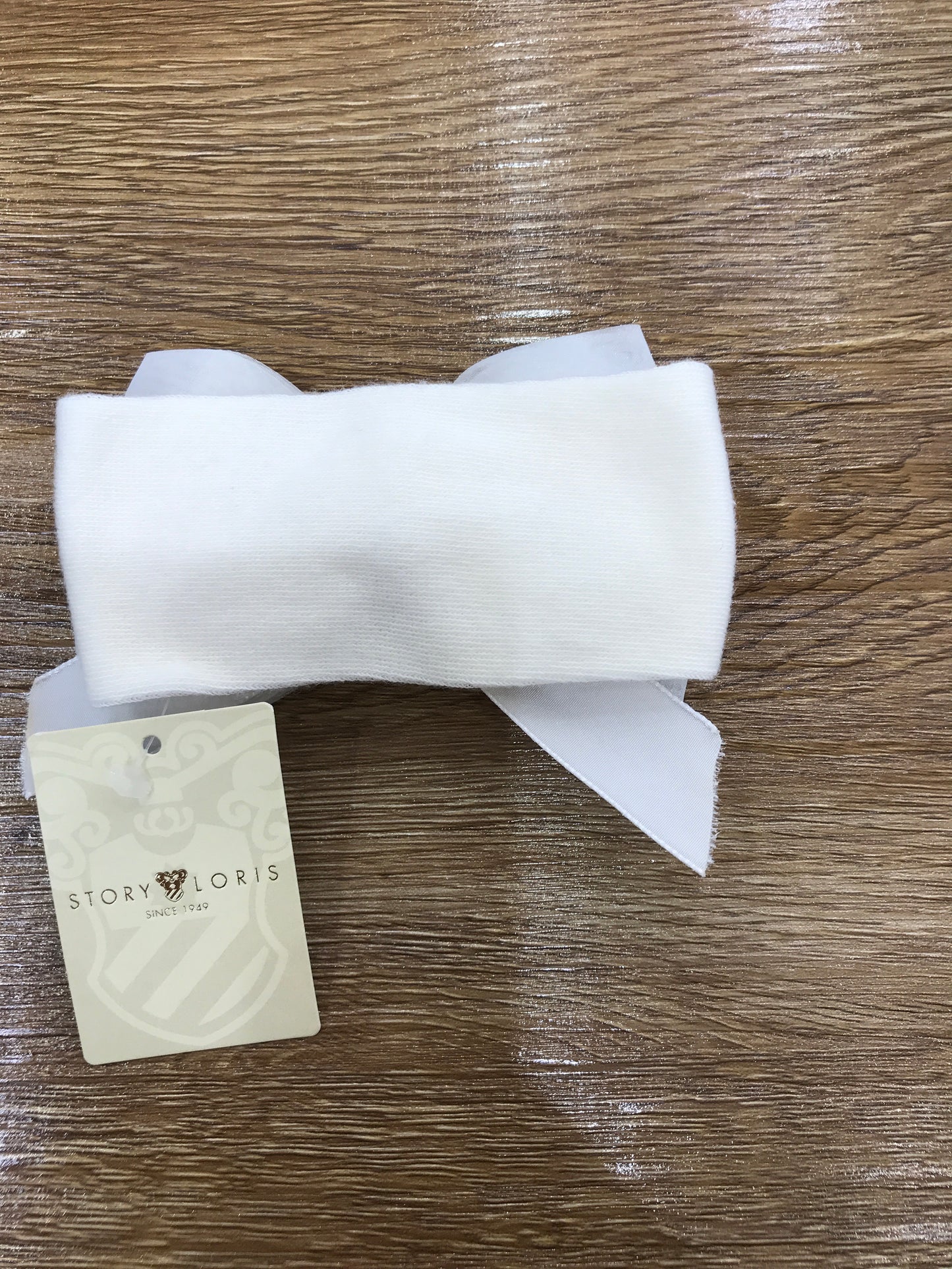 Fascia Story Loris in caldo cotone con fiocco in tulle rifinito in velluto