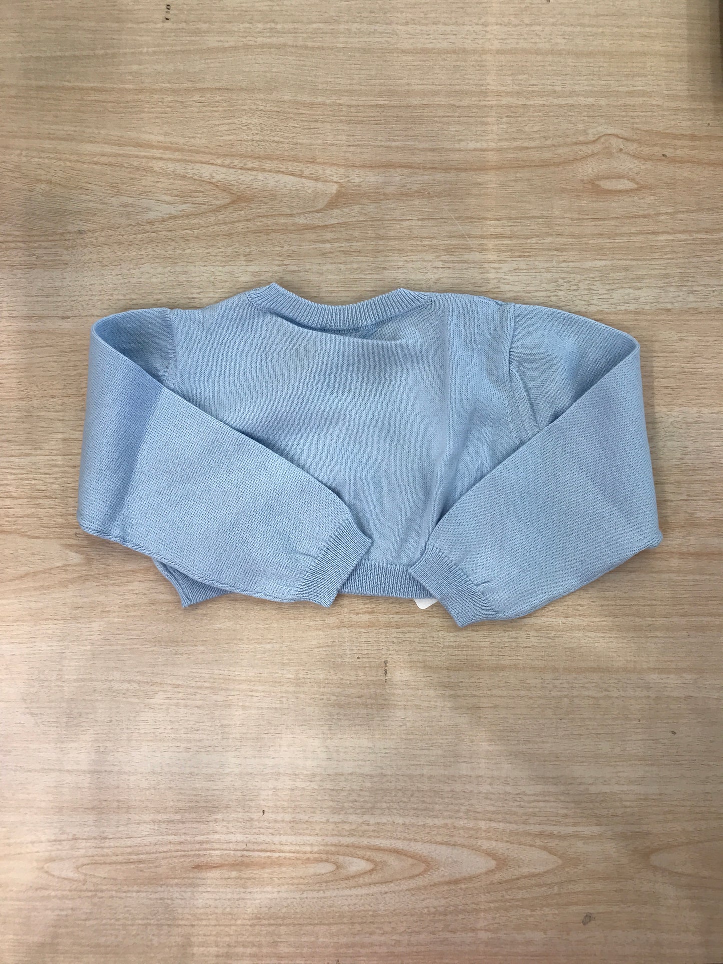 Cardigan Coccodè in filo celeste ad incrocio con piccoli bottoncini