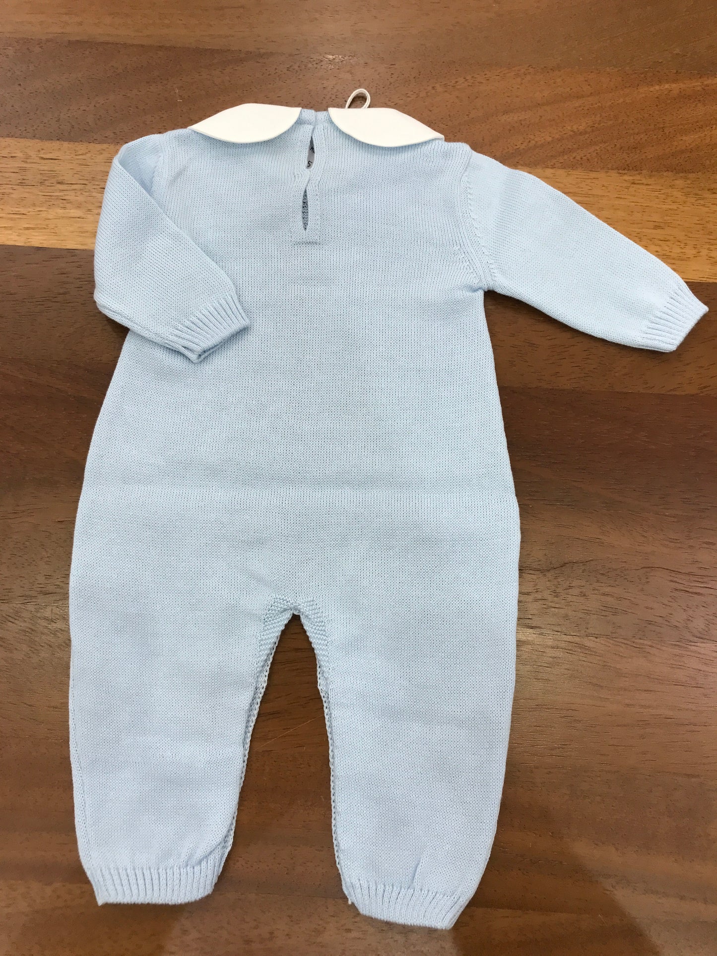 Tutina Baby Lord in filo manica lunga con lavorazione di trecce sul davanti collo tondo bianco