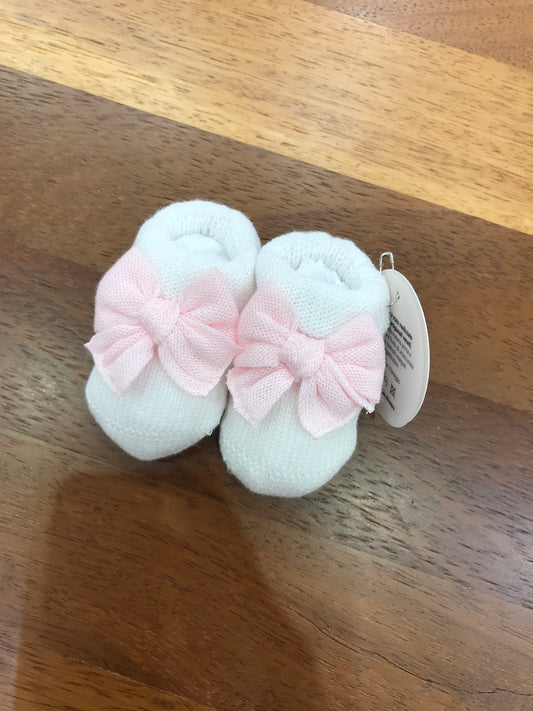 Babbucce Baby Lord in filo bianco con fiocco applicato in rosa sul davanti