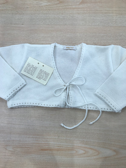 Cardigan Baby Lord in filo panna con lacci per fiocco