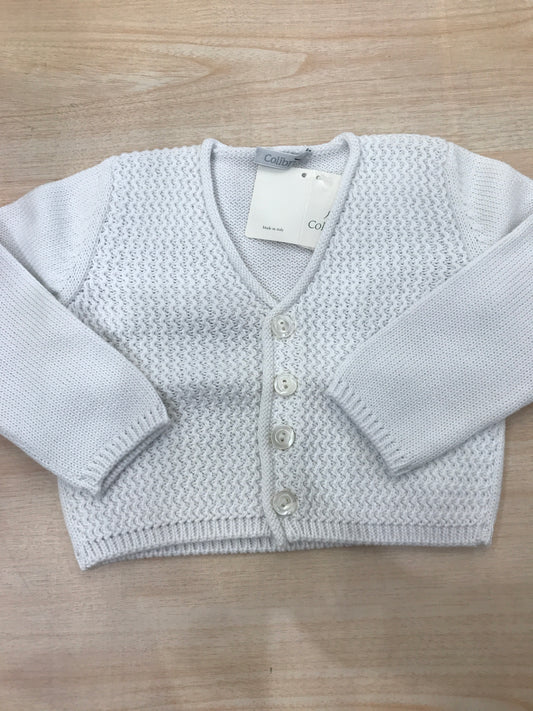 Cardigan Colibrì in filo bianco con bottoncini completamente lavorato