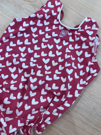 Costume Al Agua Patos intero fucsia a cuoricini bianchi e scollato sul retro