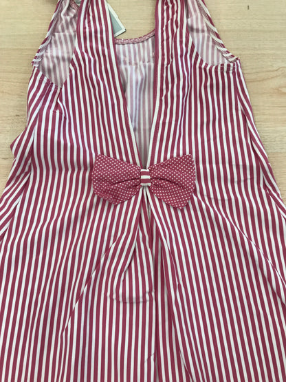 Copricostume Al Agua Patos a righe bianche e fucsia  bretelle con fiocchetti