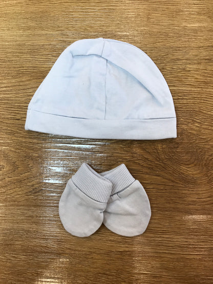 Cappello con muffole Martin Aranda in cotone celeste polvere