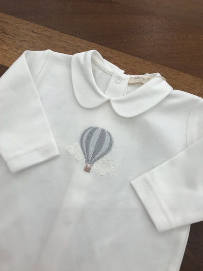 Tutina Baby Gi in cotone intera con piedini manica lunga con collo tondo bianco con mongolfiera