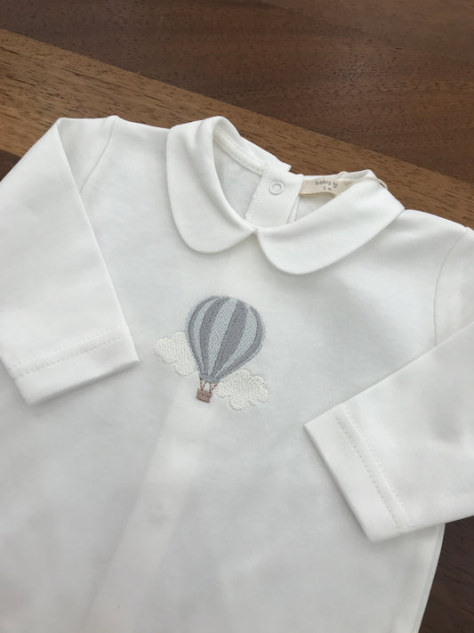 Tutina Baby Gi in cotone intera con piedini manica lunga con collo tondo bianco con mongolfiera