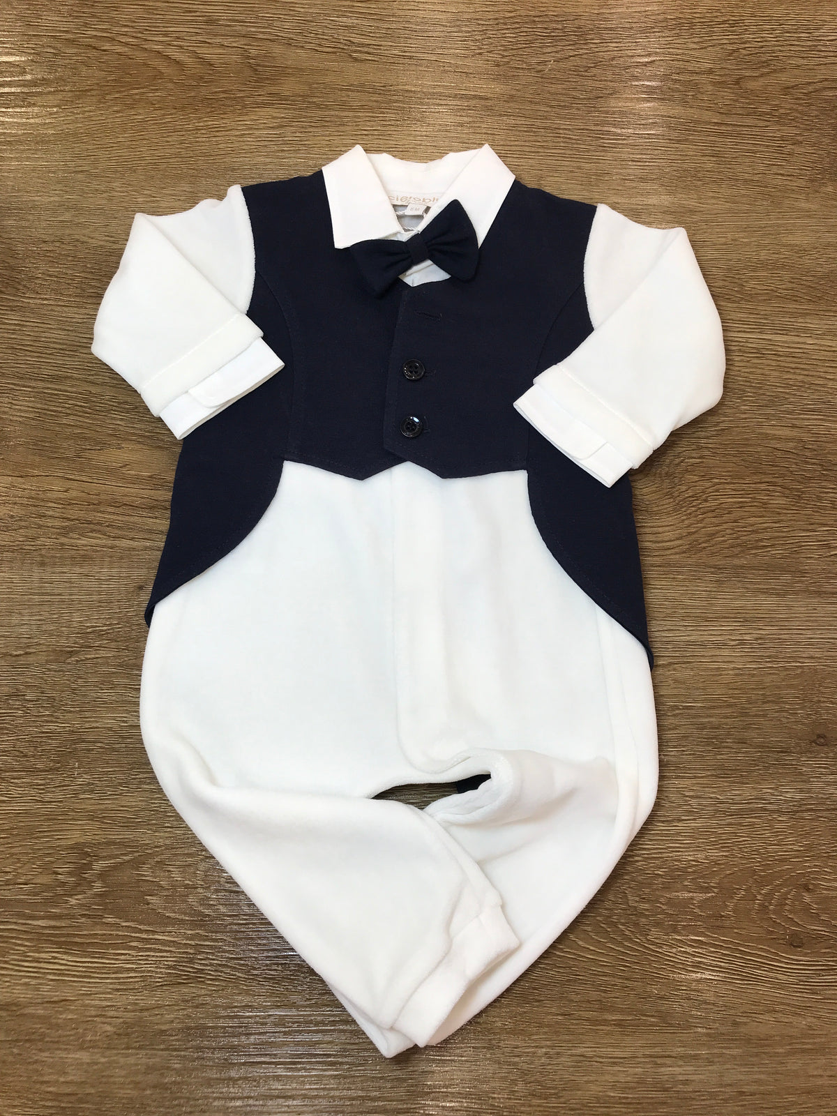 Tutina Cielo Blu in caldo cotone intera bianca con finto gilet blu scuro e papillon