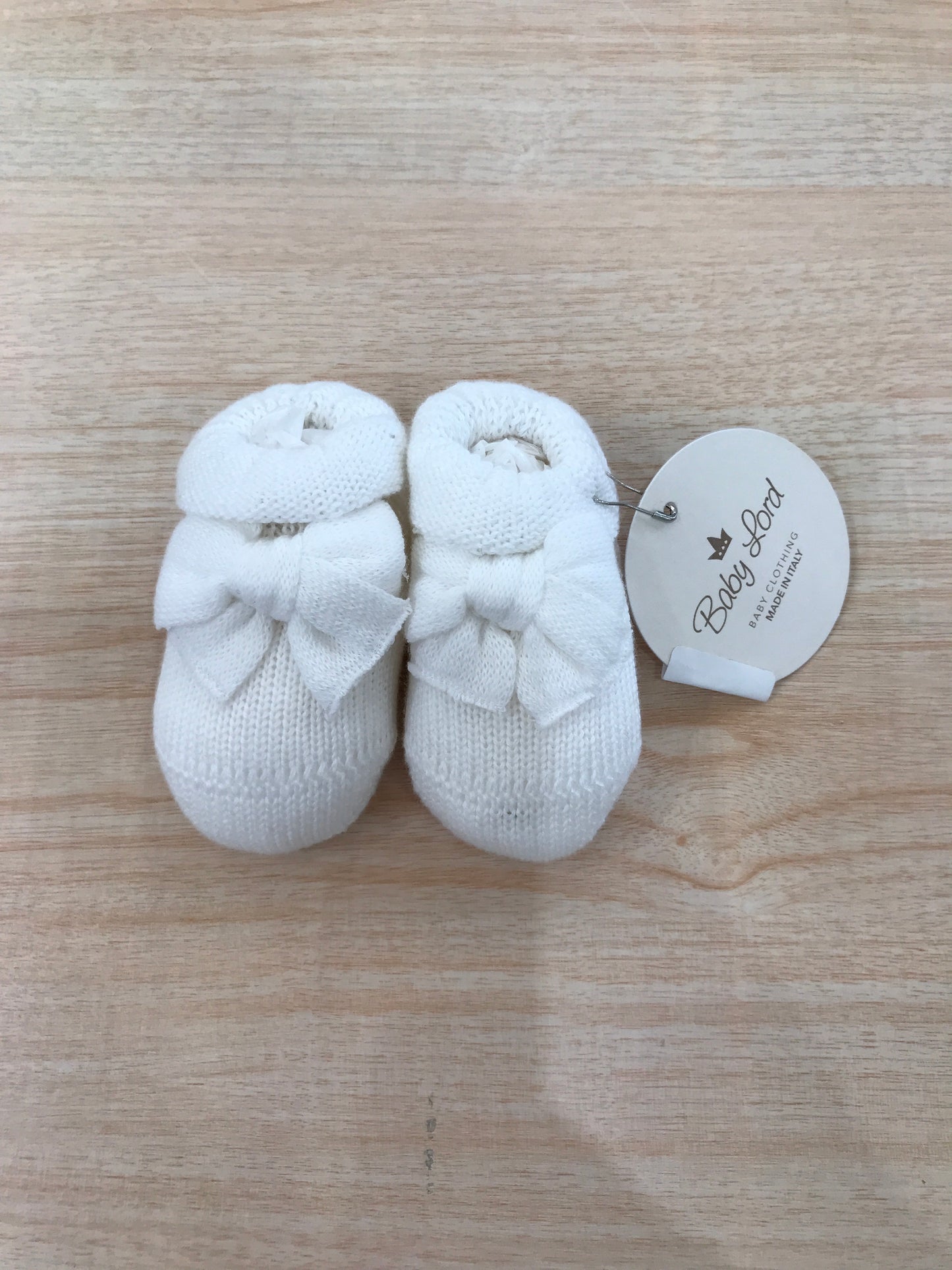 Babbucce Baby Lord in filo bianco con fiocchetto bianco