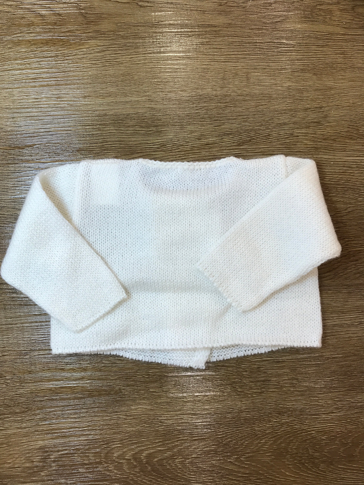 Cardigan Juppolà in lana panna con piccoli fiocchetti in velluto applicati vicino ai bottoncini