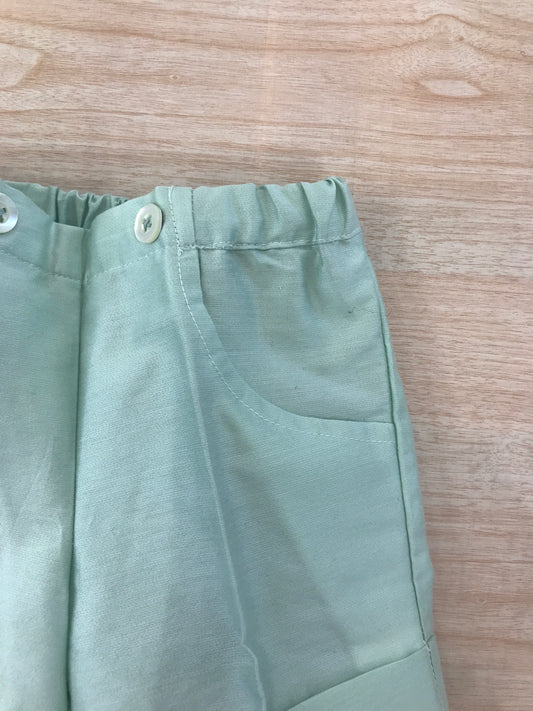 Bermuda Les Enfants de Gisele in saten verde con tasca a profilo