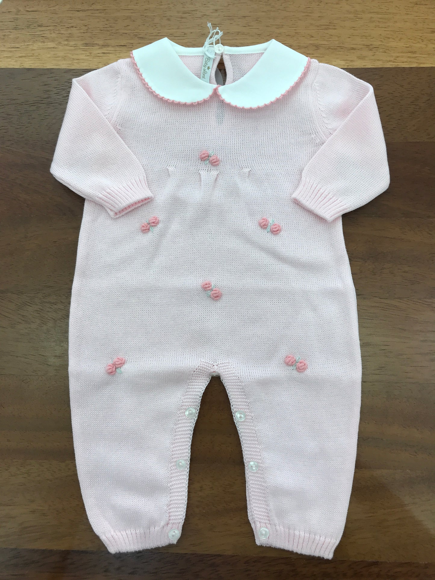 Tutina Baby Lord in filo rosa manica lunga con rose corallo ricamate sul davanti