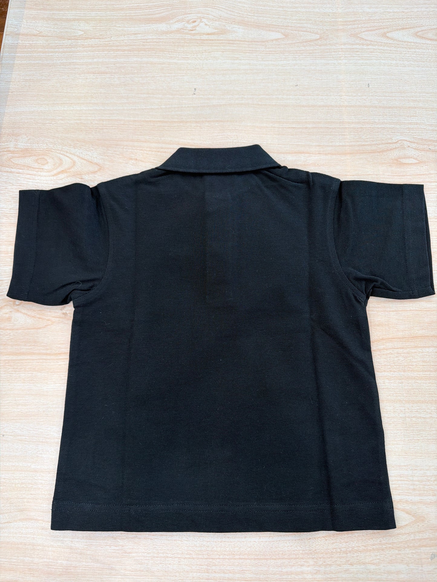 Polo Lacoste in cotone mezza manica con bottoncini e logo ricamato lateralmente unisex