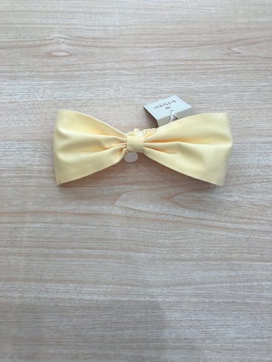 Fascia Le Bebè in cotone giallo a forma di fiocco con elastico sul retro