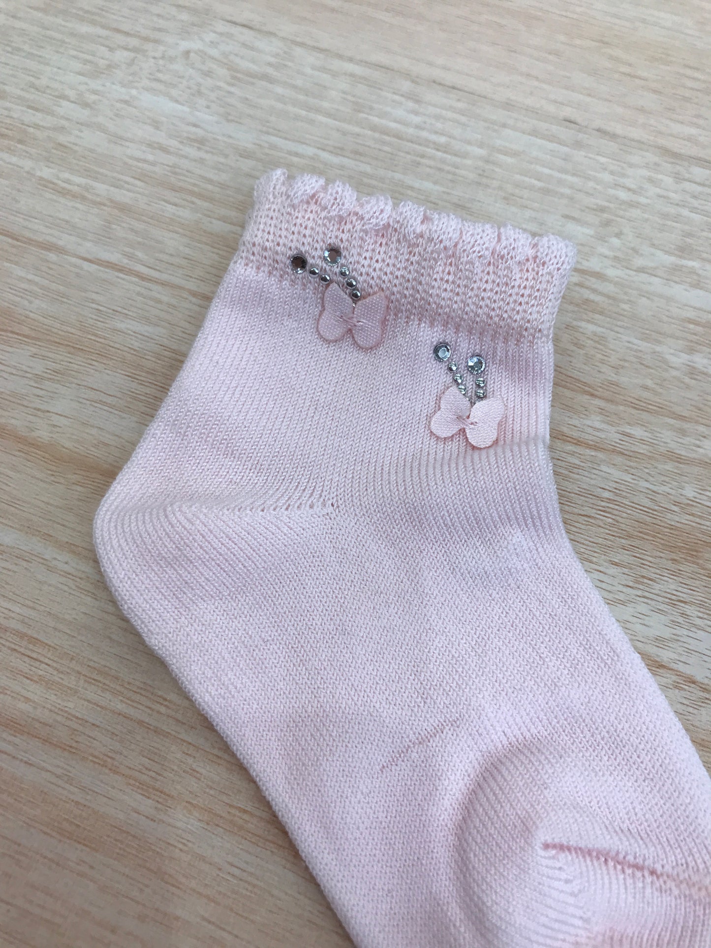 Calzino Story Loris in filo rosa con farfalle e brillantini