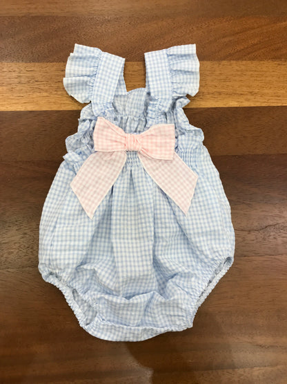 Pagliaccetto Baby Gi in cotone fantasia a quadretti con spalline con rusche con fiocco sul retro