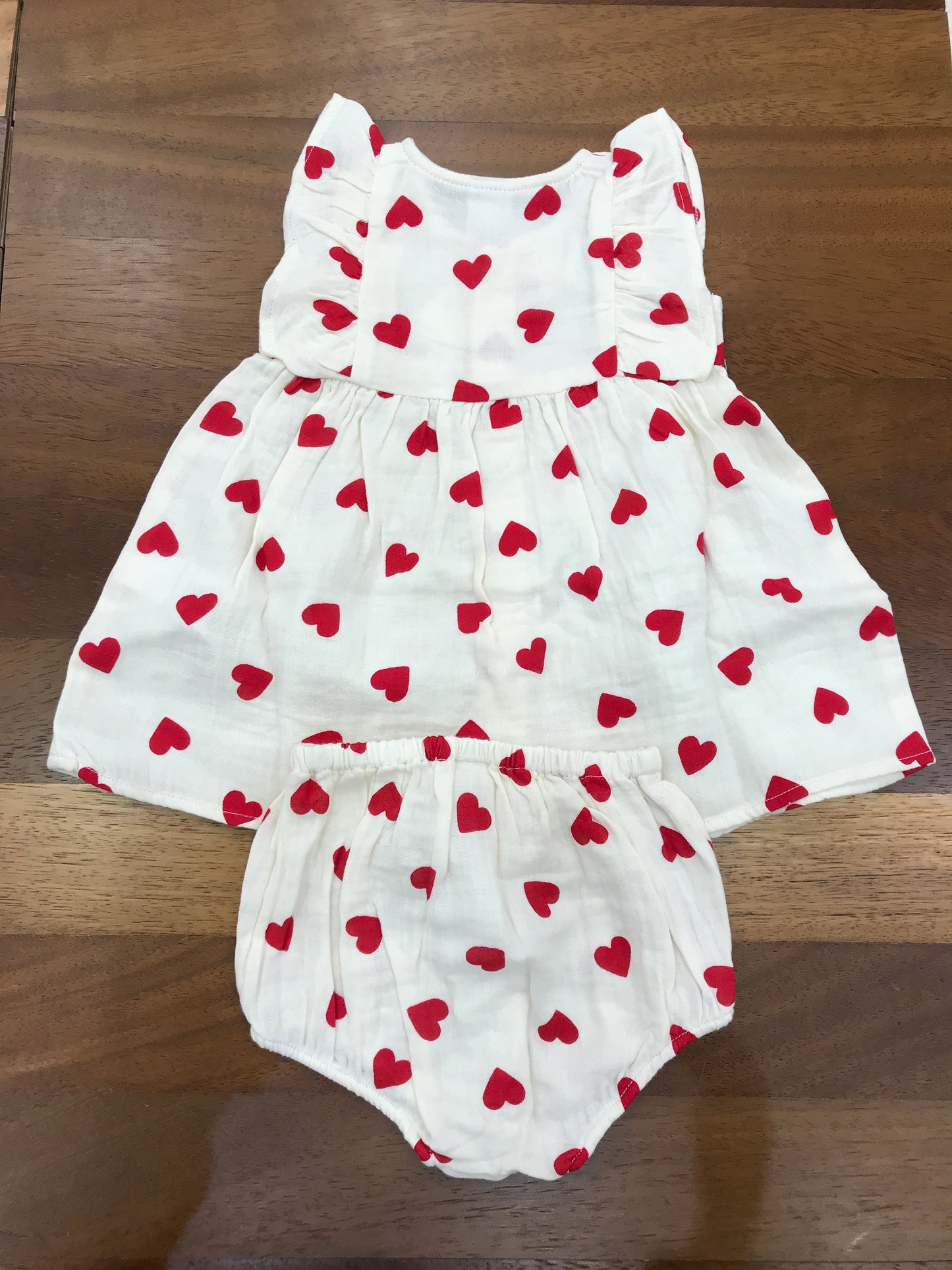 Completino Petit Bateau in cotone a cuoricini rossi