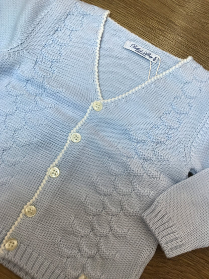 Cardigan Bebè di Almy in lana celeste con lavorazione sul davanti piccoli bottoncini e punto gambero sul davanti
