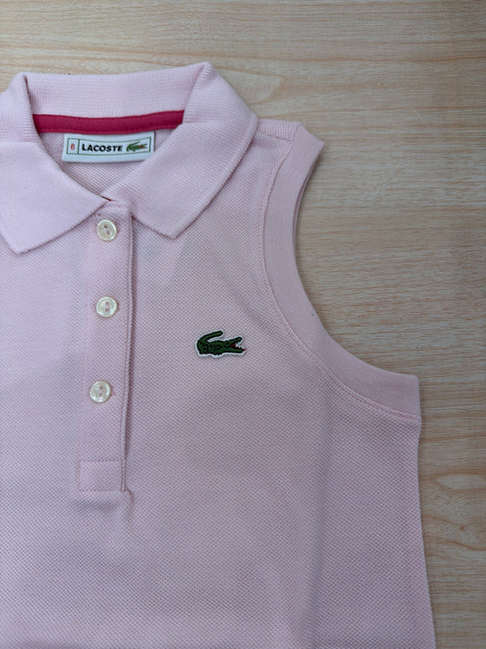 Polo Lacoste in cotone smanicata  con bottoncini e logo ricamato lateralmente
