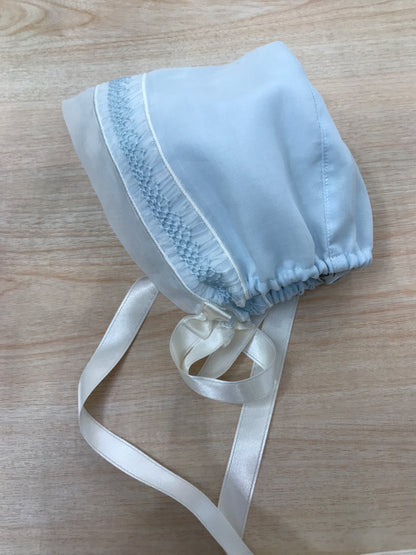 Cuffia Piccola Giuggiola in organza in seta con lavorazione di punto smock sul davanti