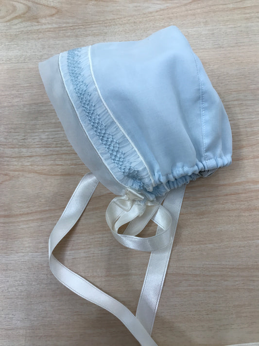 Cuffia Piccola Giuggiola in organza in seta con lavorazione di punto smock sul davanti