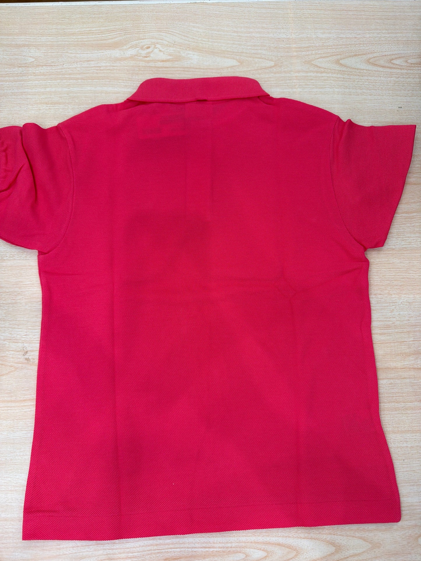 Polo Lacoste in cotone mezza manica con bottoncini e logo ricamato lateralmente unisex