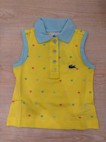 Polo Lacoste in cotone smanicata con bottoncini e logo ricamato lateralmente unisex