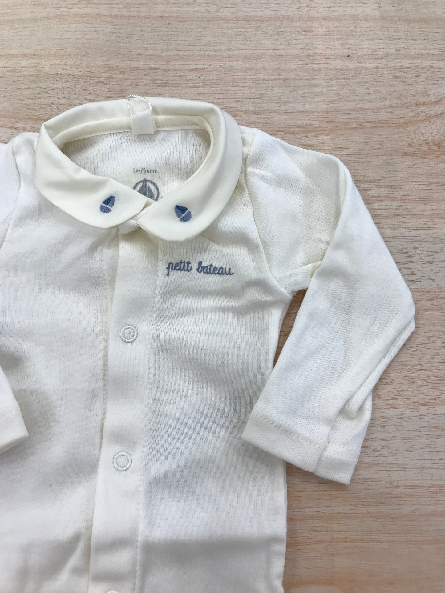 Body Petit Bateau in cotone manica lunga panna con barche ricamate sul colletto
