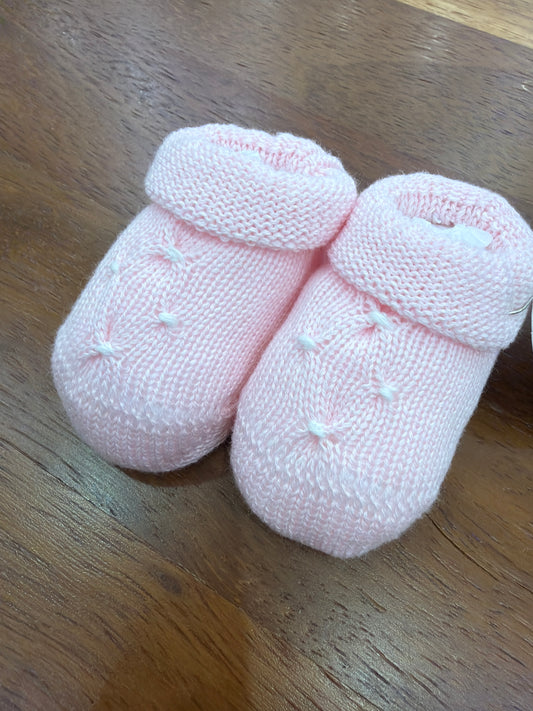 Babbucce Baby Lord in filo rosa con lavorazione di punto smock bianco