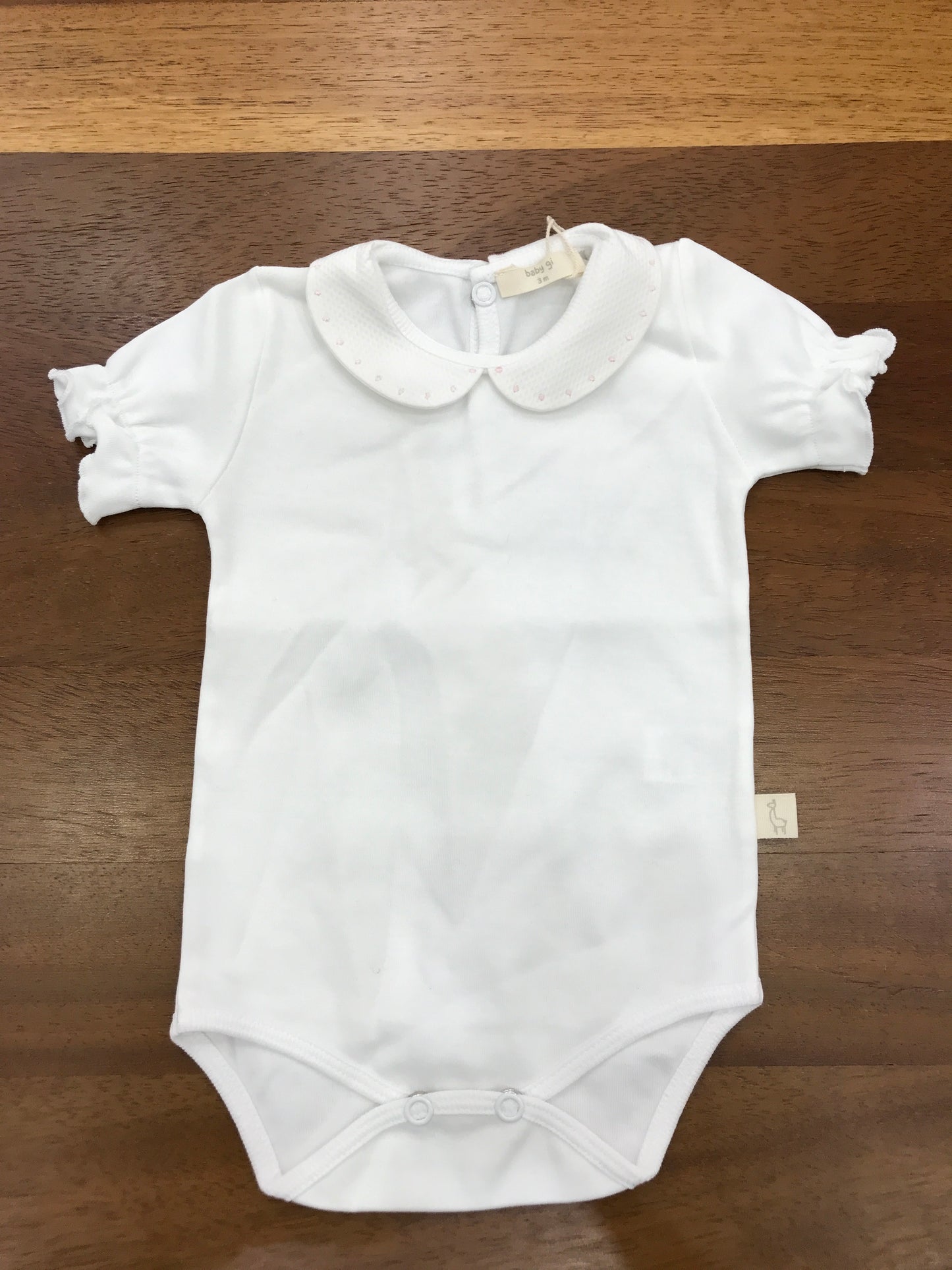 Body Baby Gi in cotone mezza manica con collo con pois rosa