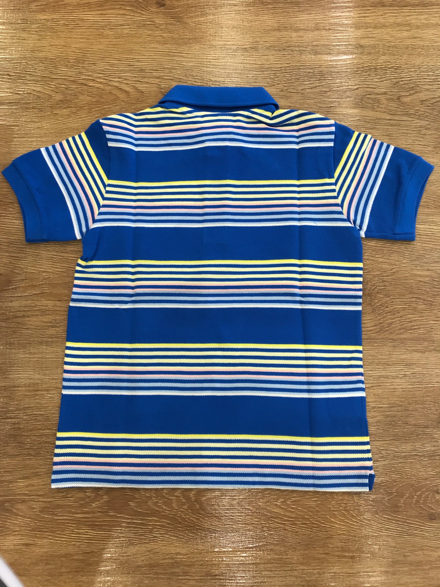 Polo Lacoste mezza manica  a righe con polsini e bottoncini