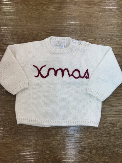 Maglione Fofettes panna con piccoli bottoncini e ricamo rosso sul davanti "xmas"