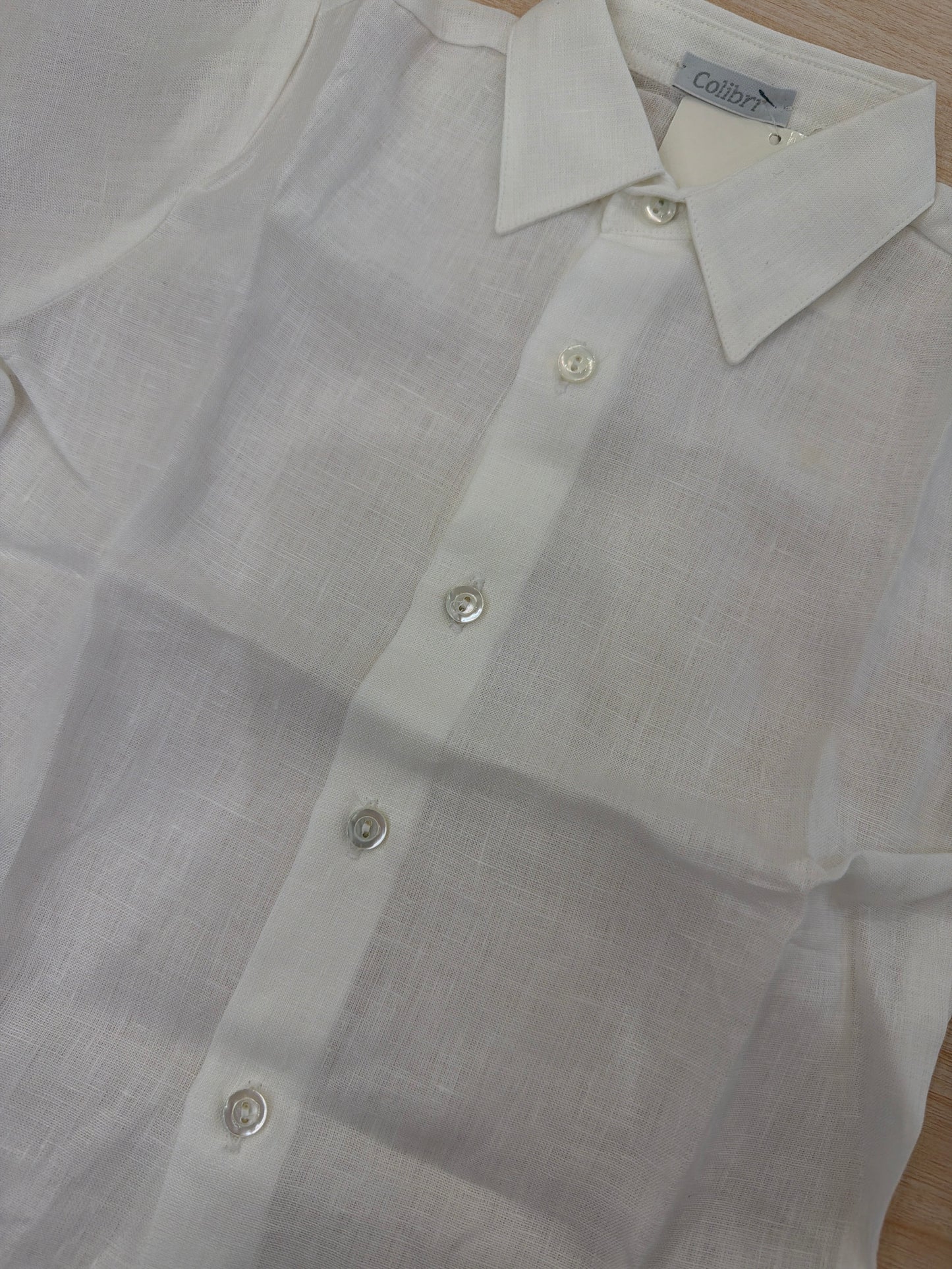 Camicia Colibrì in lino mezza manica con collo a punta e bottoncini sul davanti