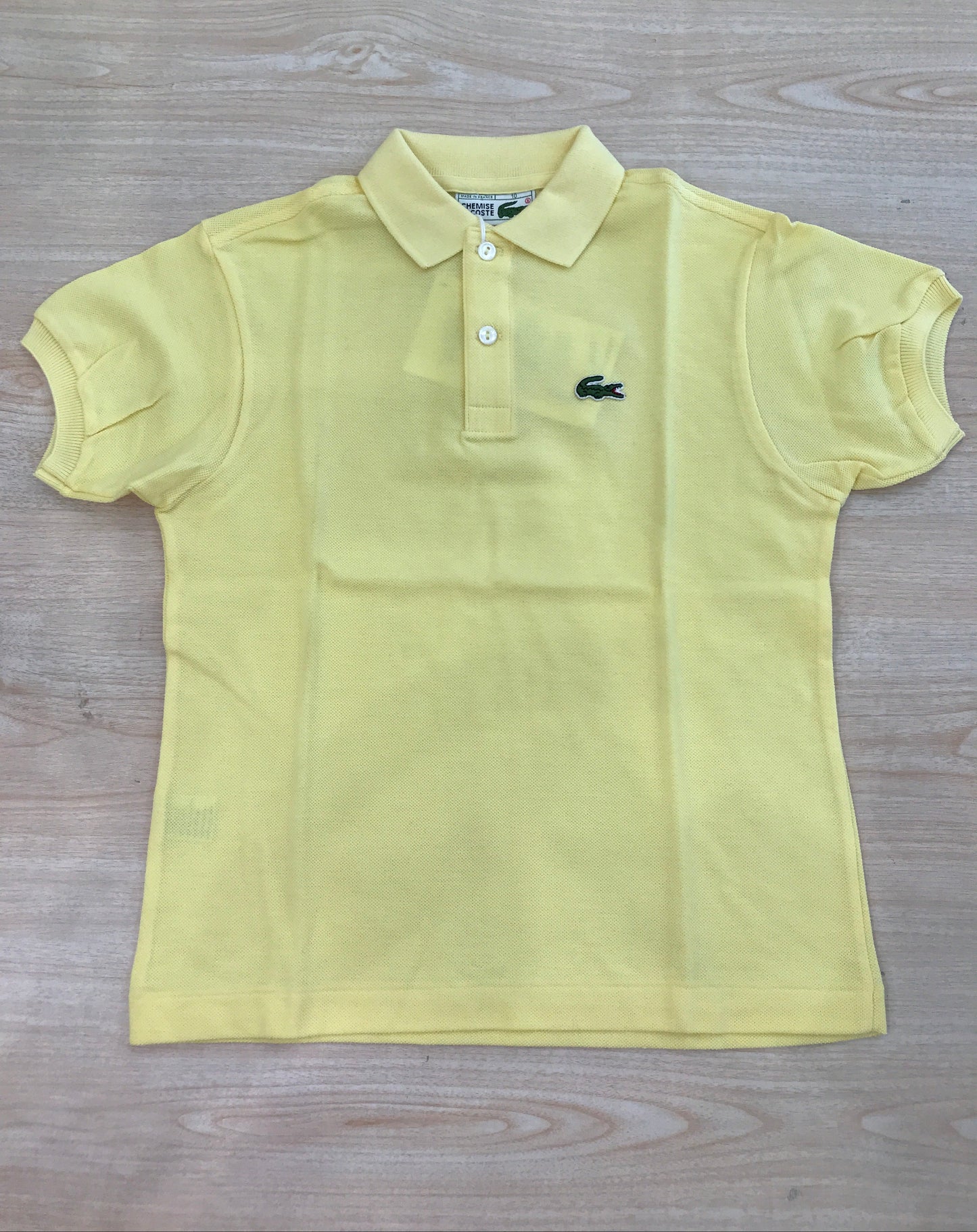 Polo Lacoste in cotone mezza manica con bottoncini e logo ricamato lateralmente unisex