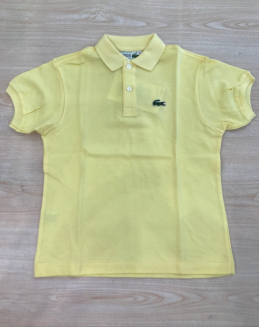 Polo Lacoste in cotone mezza manica con bottoncini e logo ricamato lateralmente unisex
