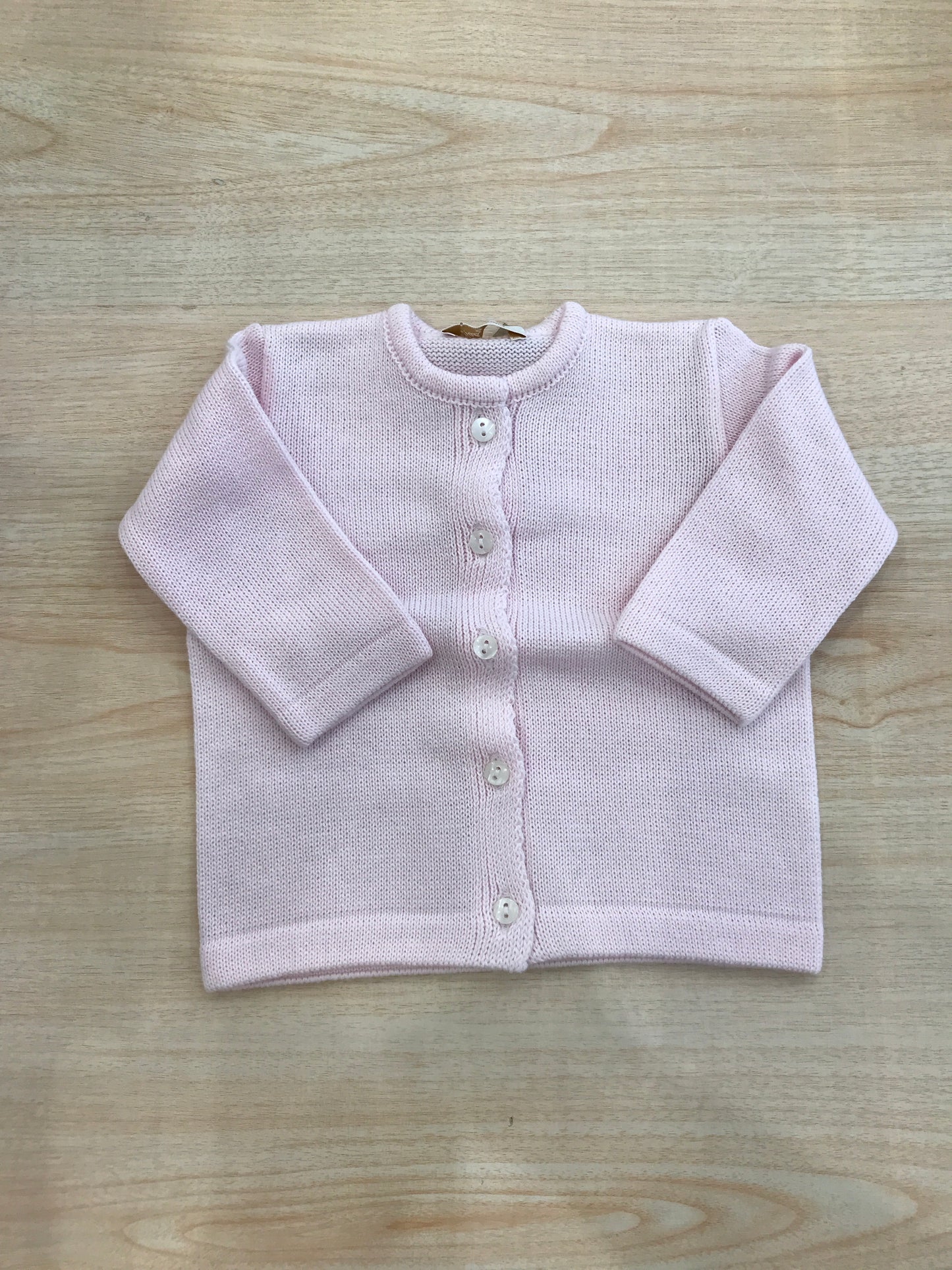 Cardigan Baby Lord in filo rosa con piccoli bottoncini sul davanti modello coreano