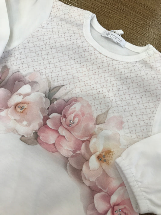 Pagliaccetto Sofija in caldo cotone manica lunga con fiori in rosa sul davanti