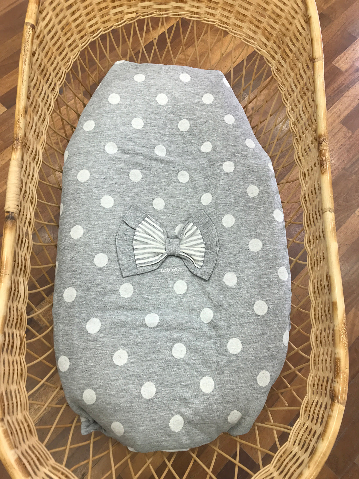 Coperta Nanan in caldo cotone con pois e fiocco ed interno a righe