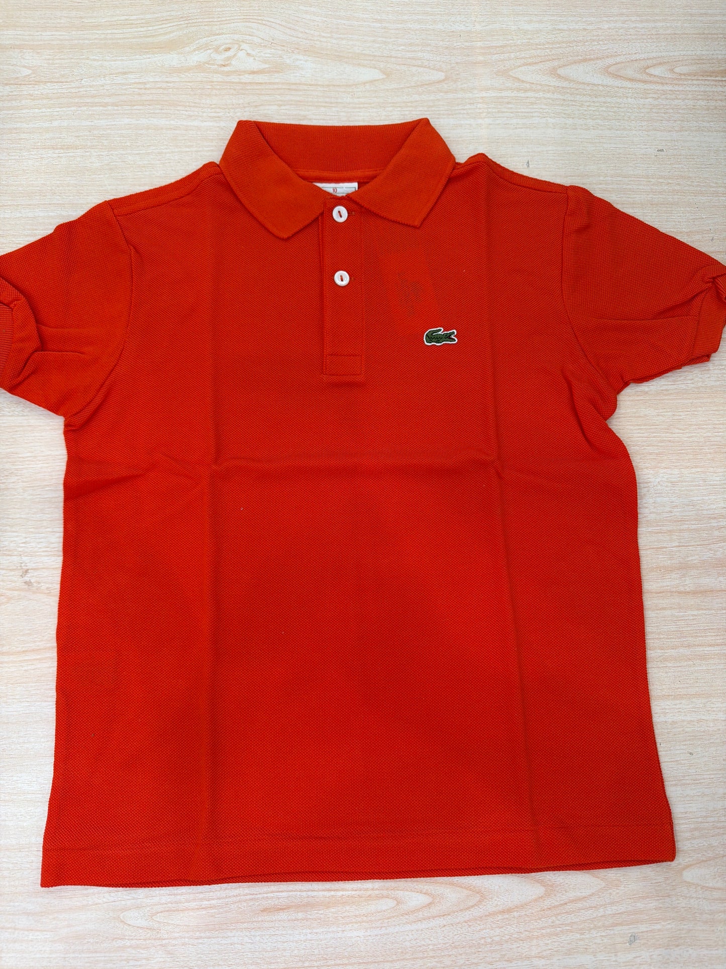 Polo Lacoste in cotone mezza manica con bottoncini e logo ricamato lateralmente unisex
