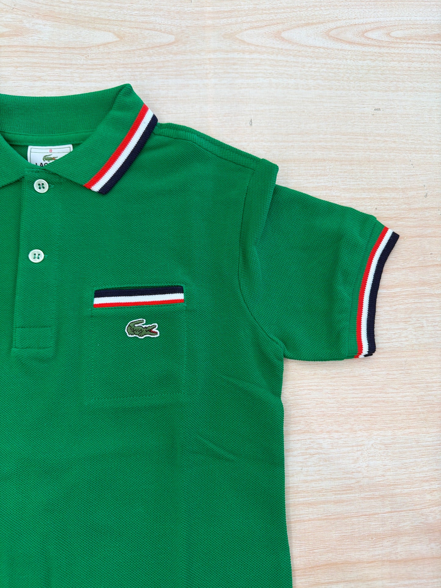 Polo Lacoste in cotone mezza manica con bottoncini e logo ricamato lateralmente unisex