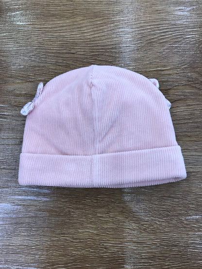 Cappello Nanan in ciniglia a costine rosa antico con risvolto e fiocchetti con fiori laterali