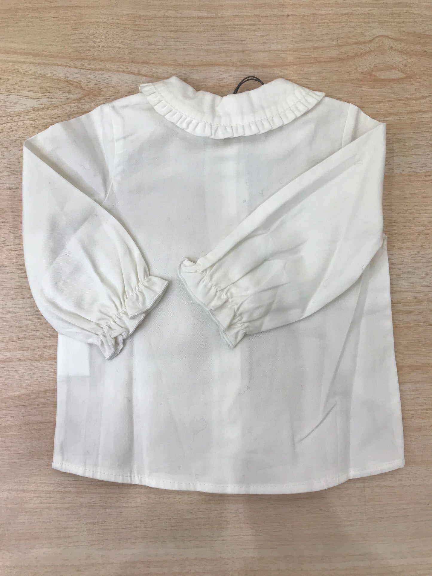 Camicia Jo Milano manica lunga di cotone bianco con manica a sbuffo con colletto con rusche