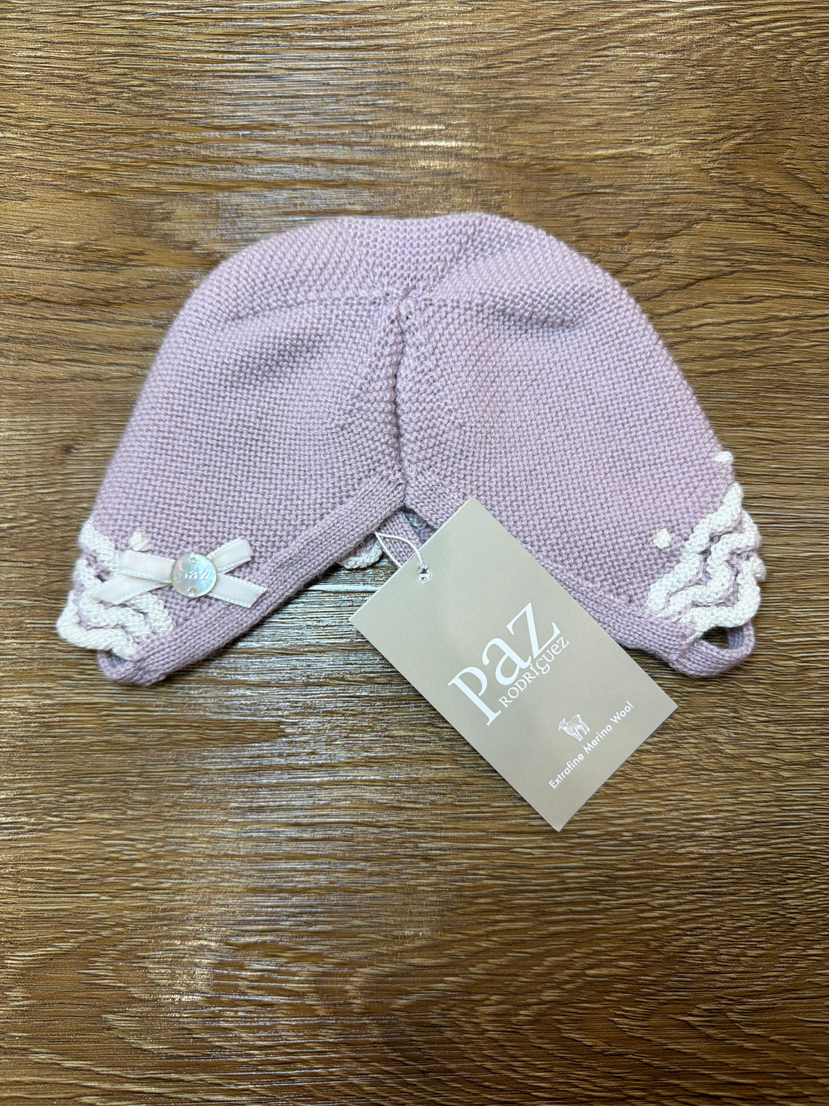 Cuffia Paz Rodriguez in lana rosa cipolla con rusche panna